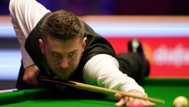 Defending champ Mark Williams escapes from snooker with 